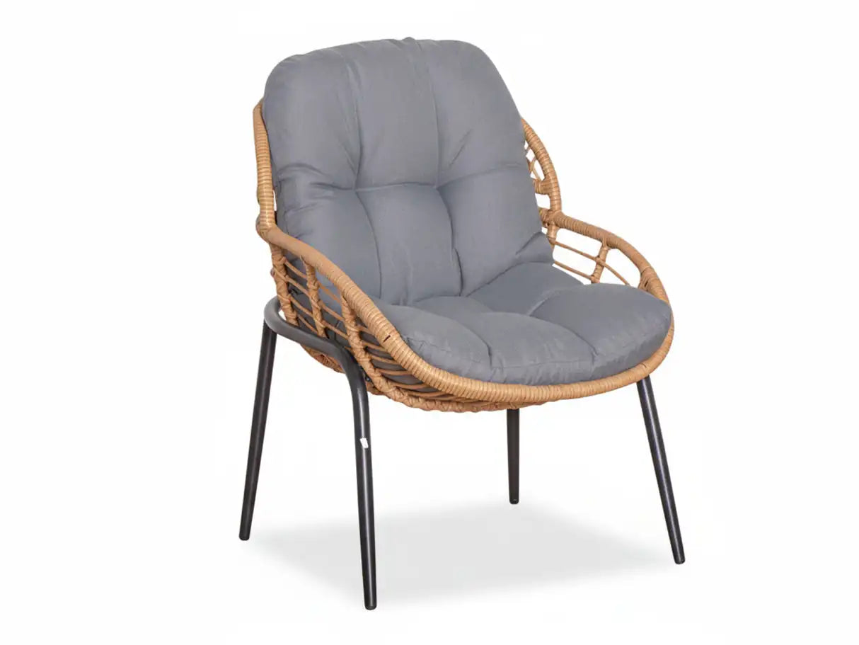Wicker chair with gray cushion on a white background