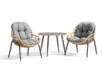 Two wicker chairs with gray cushions and a matching round table on a white background Leading Landscapes Canterbury