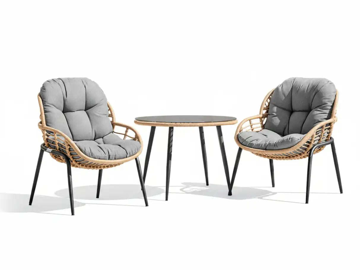 Two wicker chairs with gray cushions and a matching round table on a white background Leading Landscapes Canterbury