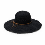 A black woven sun hat with a wide brim, a thin brown band, and a matching brown bow, shown on a plain white background.