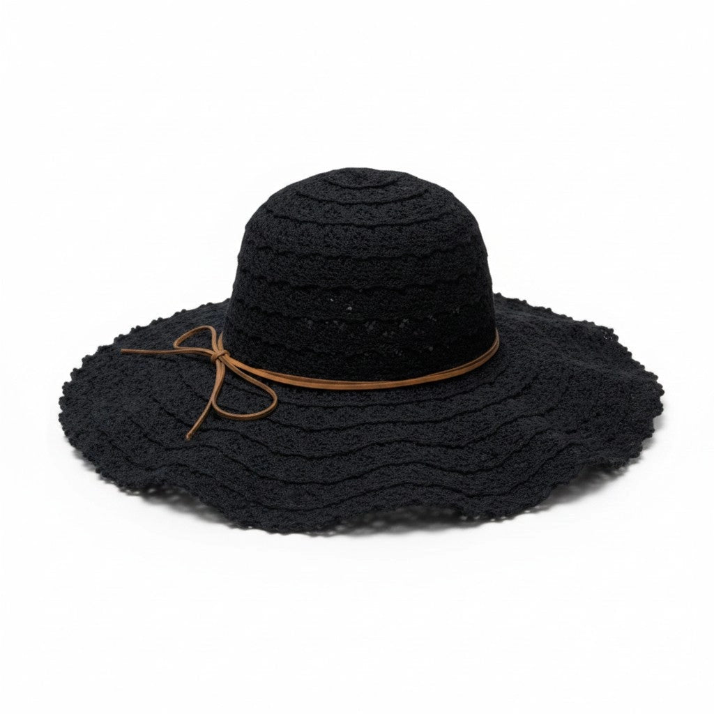 A black woven sun hat with a wide brim, a thin brown band, and a matching brown bow, shown on a plain white background.