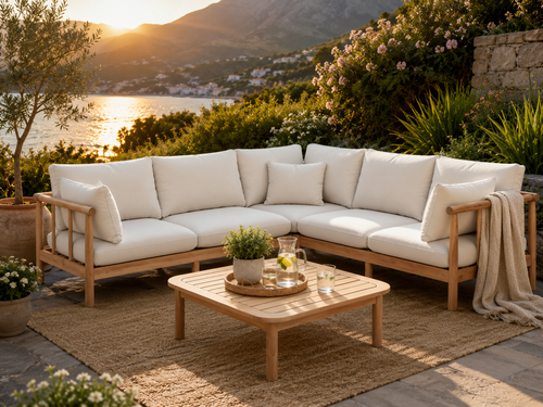 Outdoor seating area with a sectional sofa, coffee table, and scenic view of water and mountains. Leading Landscapes Canterbury
