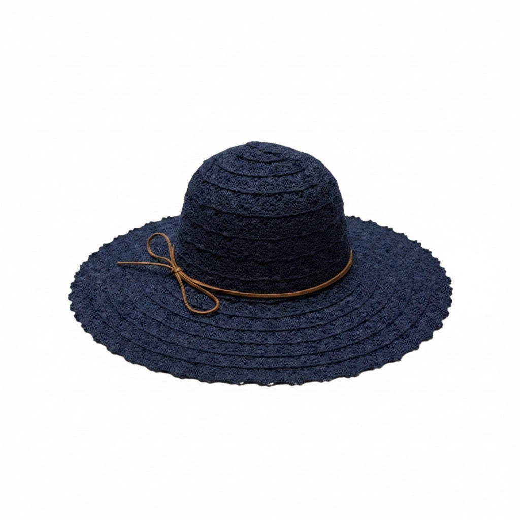 A navy blue woven sun hat with a wide brim, a thin brown band, and a small bow detail on the side, shown against a plain white background.