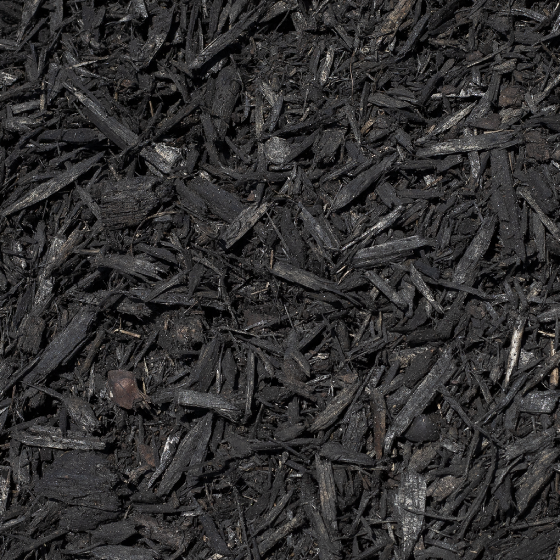 Double black bark mulch for garden beds — dark decorative finish — Leading Landscapes Canterbury
