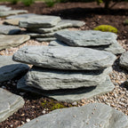 Close-up of schist stepper stones with visible texture - Leading Landscapes Limited