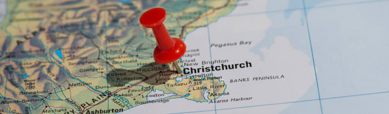 Map of New Zealand with a red pushpin marking Christchurch