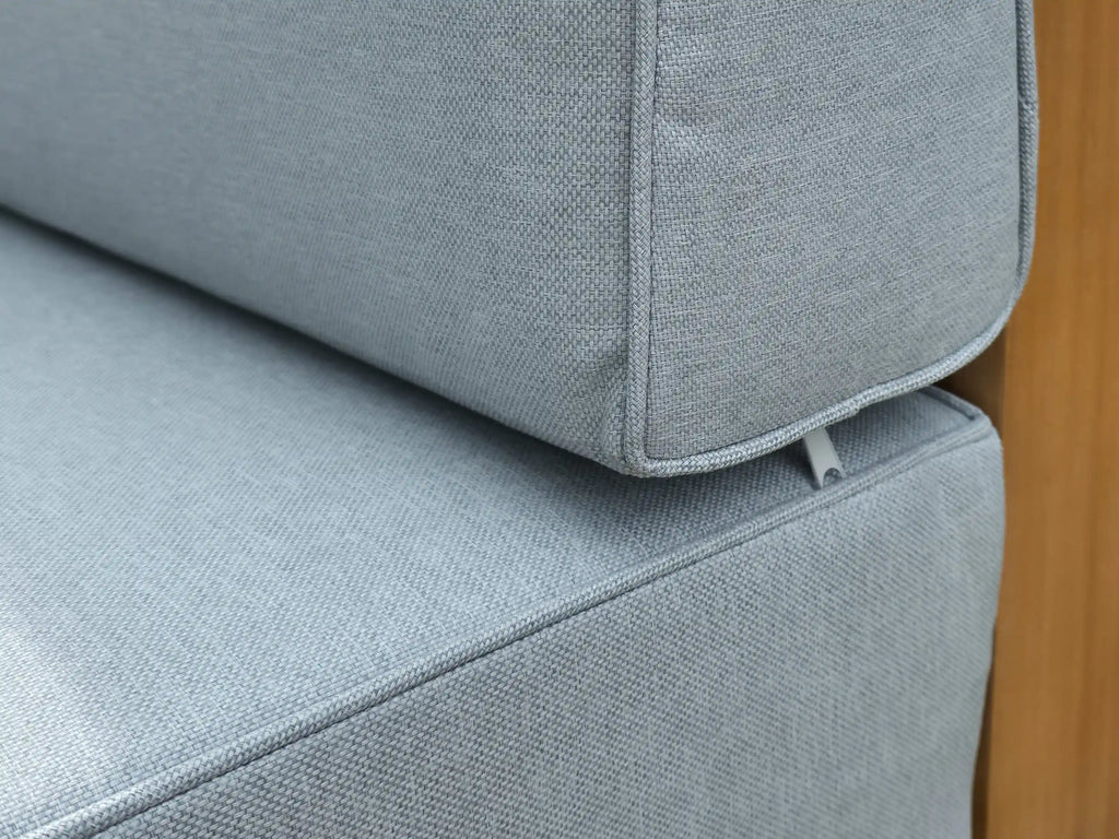 Gray fabric sofa corner with wooden edging - garden furniture - Leading Landscapes Canterbury